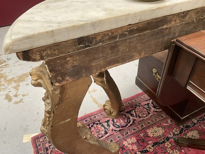 Lot 1260 - 19th century gilt painted and carved console table on four scroll cabriole legs with floral crestings and a serpentine marble top