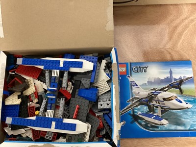 Lot 683 - Lego Star Wars constructed spaceships and Lego City models, plus some mini figs (2 boxes)