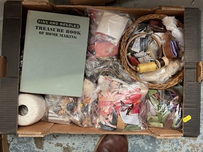 Lot 48 - Two boxes of mixed linen and lace, two boxes of material, two boxes of vintage sewing items, and one box of vintage baby clothes (7 boxes)