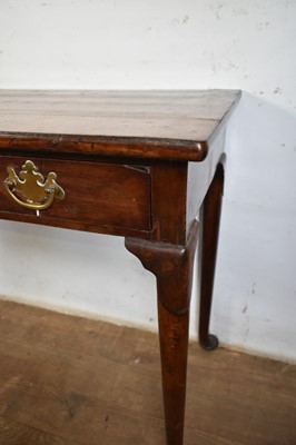 Lot 1280 - George II walnut single drawer side table