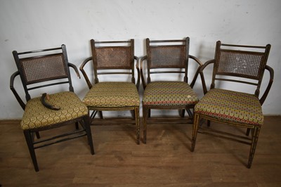 Lot 1284 - Set of four Regency painted elbow chairs