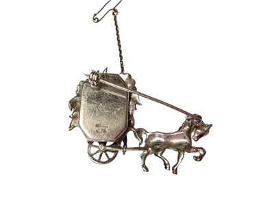 Lot 70 - 1950s silver and marcasite novelty brooch in the form of a horse pulling a floral carriage with a concealed Bimesa watch, 50mm