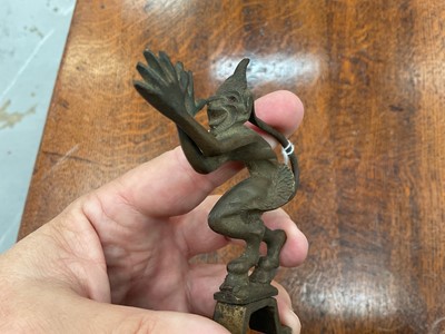 Lot 15 - Vintage bronzed metal car mascot in the form of a devil, 9cm in overall height.