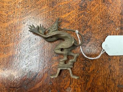 Lot 15 - Vintage bronzed metal car mascot in the form of a devil, 9cm in overall height.