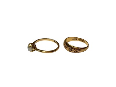 Lot 28 - 18ct gold single cultured pearl ring and 18ct gold diamond three stone gypsy set ring (2)