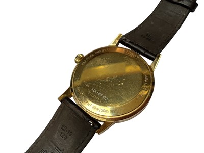 Lot 40 - Tissot 'Classic Dream' gold plated stainless steel quartz wristwatch, 42mm diameter, on Tissot brown leather strap, boxed with original reciept