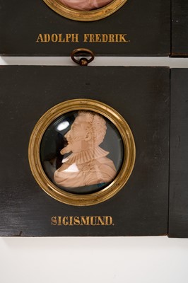 Lot 739 - Set of sixteen 19th century wax profile portraits of European royals