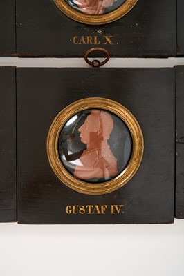 Lot 739 - Set of sixteen 19th century wax profile portraits of European royals
