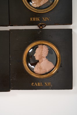 Lot 739 - Set of sixteen 19th century wax profile portraits of European royals