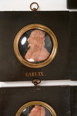 Lot 739 - Set of sixteen 19th century wax profile portraits of European royals