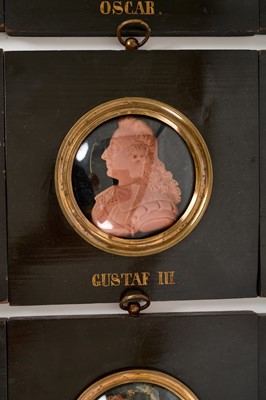 Lot 739 - Set of sixteen 19th century wax profile portraits of European royals