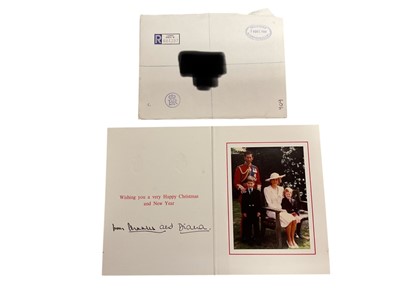 Lot 31 - T.R.H. The Prince and Princess of Wales, signed 1988 Christmas card with twin gilt Royal cyphers to cover, formal colour photograph of the Royal couple with the young Princes , signed in ink ' f...