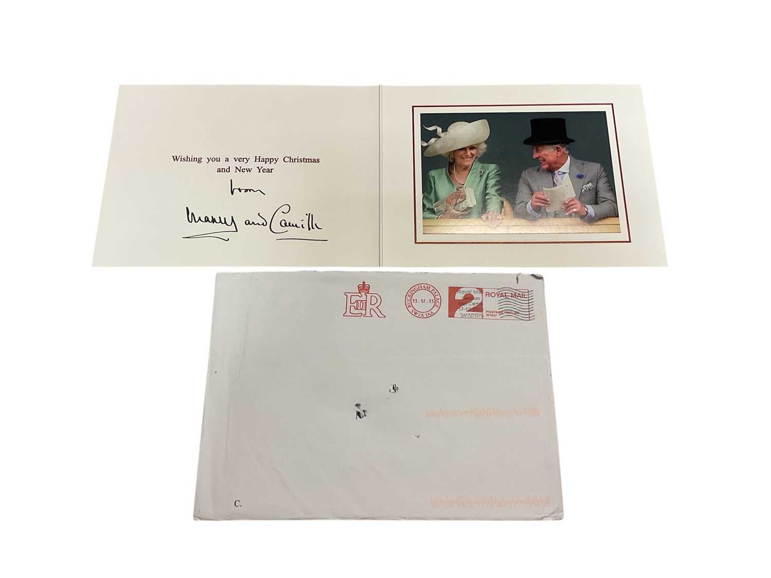 Lot 56 - H.R.H. Prince Charles Prince of Wales (now H.M. King Charles III) and H.R.H. Camilla Duchess of Cornwall (now H.M. Queen Camilla) signed 2013 Christmas card with gilt Royal cyphers to cover, colou...