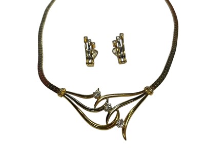 Lot 65 - Gold and diamond three stone necklace, together with a pair of similar style earrings