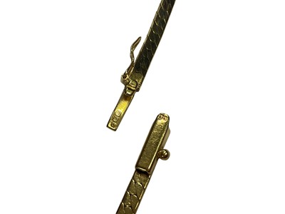Lot 65 - Gold and diamond three stone necklace, together with a pair of similar style earrings