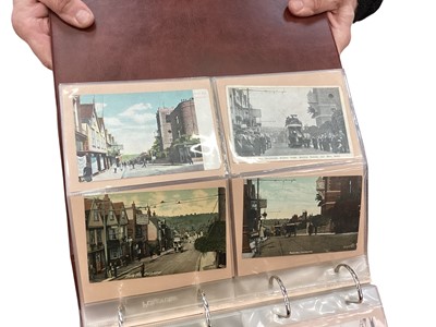 Lot 1122 - Two albums of postcards