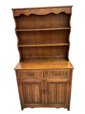 Lot 1389 - Old Charm style two height carved oak dresser
