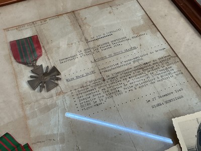 Lot 772 - Second World War French Croix de Guerre medal, mounted in glazed frame, together with citation dated 27th December 1940, presented to Miss Mary Edytha Darby