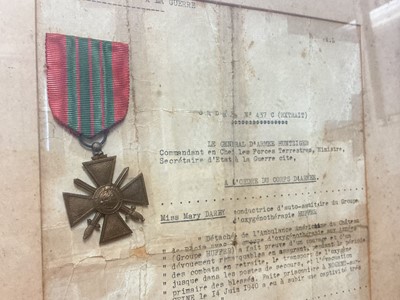Lot 772 - Second World War French Croix de Guerre medal, mounted in glazed frame, together with citation dated 27th December 1940, presented to Miss Mary Edytha Darby