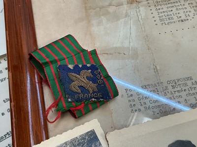 Lot 772 - Second World War French Croix de Guerre medal, mounted in glazed frame, together with citation dated 27th December 1940, presented to Miss Mary Edytha Darby