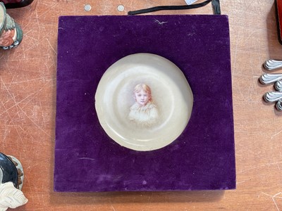 Lot 5109 - 19th century porcelain plaque, painted with a child, in velvet frame