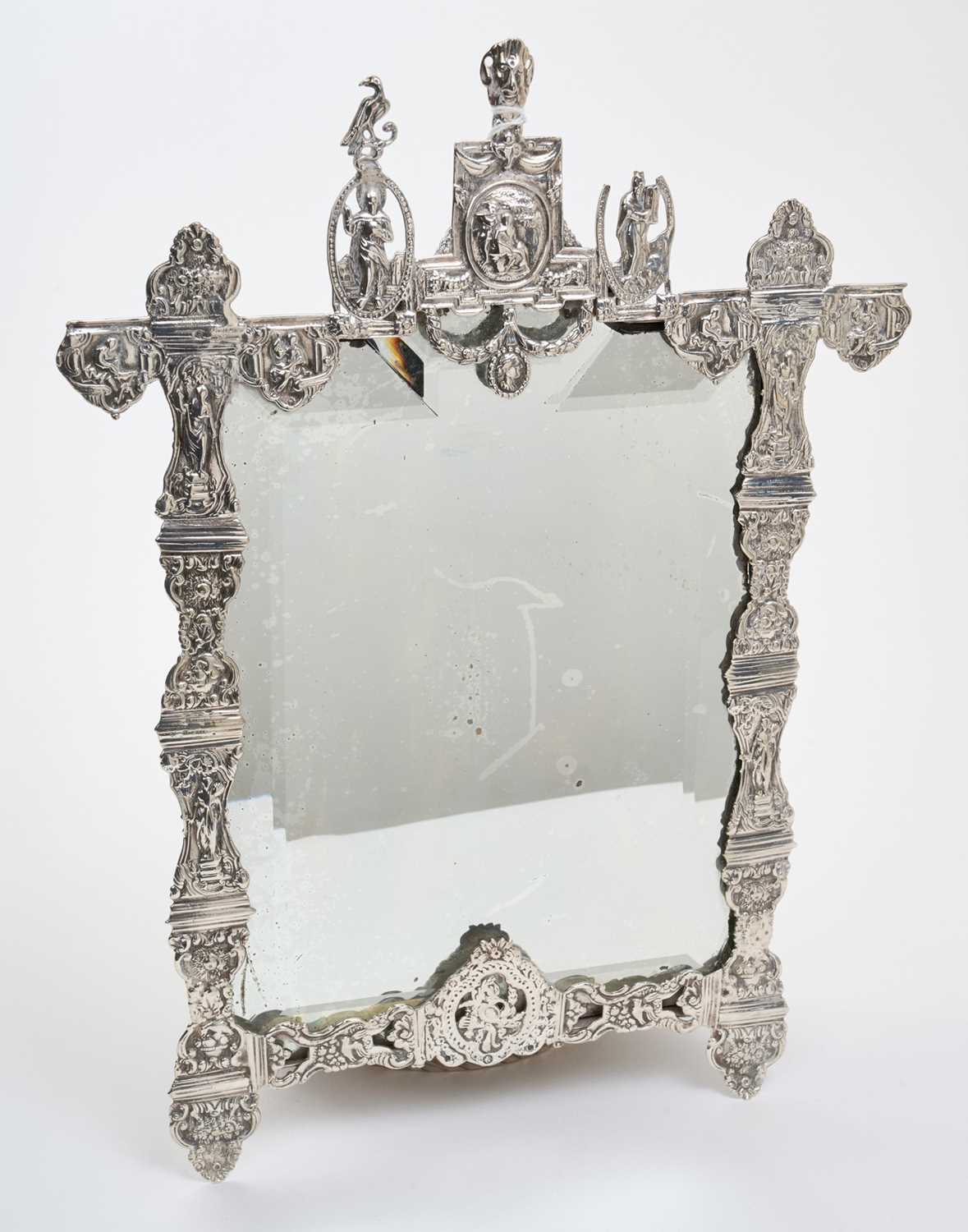 Lot 453 - Judaica interest- late 19th century Dutch cast silver mirror of vertical rectangular form, decorated with scenes from the bible
