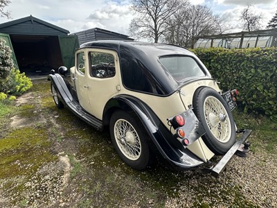 Lot 1934 Riley Kestrel 14/6 saloon, registration APP 166, black with cream coachwork with burgundy hide upholstery . Long term ownership .
