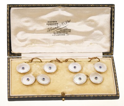 Lot Suite of gold and enamel cufflinks and dress studs, in box retailed by Searle & Co.