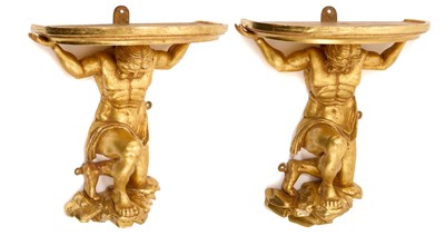 Lot Good pair of early 19th century giltwood carved wall brackets