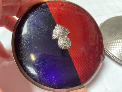 Lot 39 - 1920s silver red and blue enamelled Royal Fusiliers sweetheart powder compact, together with another 1940s silver powder compact (2)