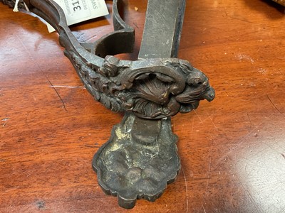 Lot 5048 - A pair of rococo-style bronze curtain tiebacks, late 19th century, each cast with acanthus leaves and shells, signed 'P D' to the reverse, 5cm wide, 15cm deep, 27cm high (2) Provenanc...