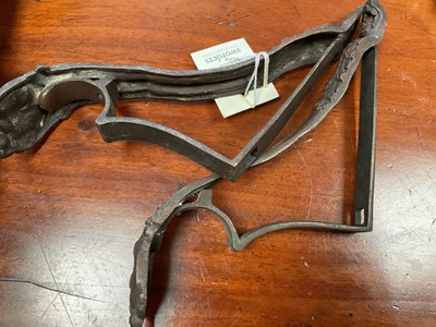 Lot 5048 - A pair of rococo-style bronze curtain tiebacks, late 19th century, each cast with acanthus leaves and shells, signed 'P D' to the reverse, 5cm wide, 15cm deep, 27cm high (2) Provenanc...