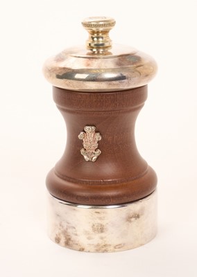 Lot 62 - H.R.H. Prince Charles Prince of Wales, Royal Christmas gift pepper grinder with silver plated mounts, turned wood body with silver Prince of Wales feather crest in original fitted box with gilt e...