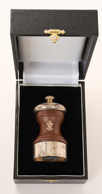 Lot 62 - H.R.H. Prince Charles Prince of Wales, Royal Christmas gift pepper grinder with silver plated mounts, turned wood body with silver Prince of Wales feather crest in original fitted box with gilt e...