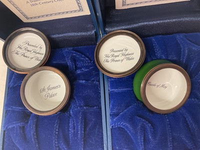 Lot 67 - H.R.H. Prince Charles, Prince of Wales, two Royal presentation Halcyon Days enamel boxes decorated with Royal Palaces