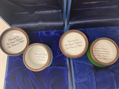 Lot 68 - H.R.H. Prince Charles, Prince of Wales, two Royal presentation Halcyon Days enamel boxes decorated with castles and landscapes