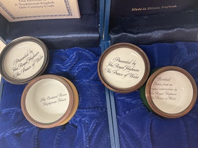 Lot 69 - H.R.H. Prince Charles, Prince of Wales, two Royal presentation Halcyon Days enamel boxes decorated with Royal residences