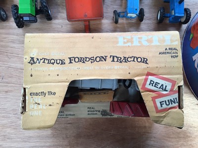 Lot 5009 - American Ertl model of an antique Fordson tractor, boxed, with other tractors and a selection of Britains and other plastic farm figures