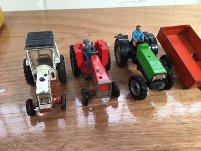Lot 5009 - American Ertl model of an antique Fordson tractor, boxed, with other tractors and a selection of Britains and other plastic farm figures