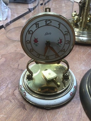 Lot 5000 - Four anniversary pendulum clocks to include three dome cased clocks to include Violeta, Schats and one other together with a quartz Haller mantel clock