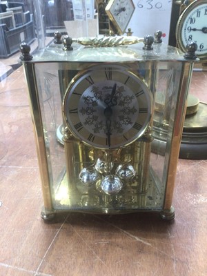 Lot 5000 - Four anniversary pendulum clocks to include three dome cased clocks to include Violeta, Schats and one other together with a quartz Haller mantel clock