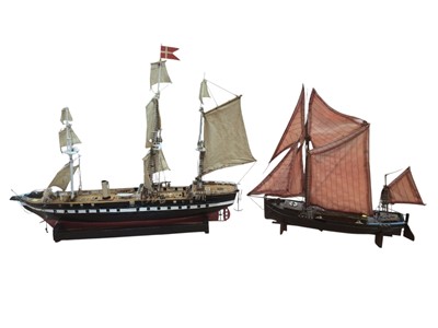 Lot 5015 - Two model ships on stands, one 81cm long the other 56cm long