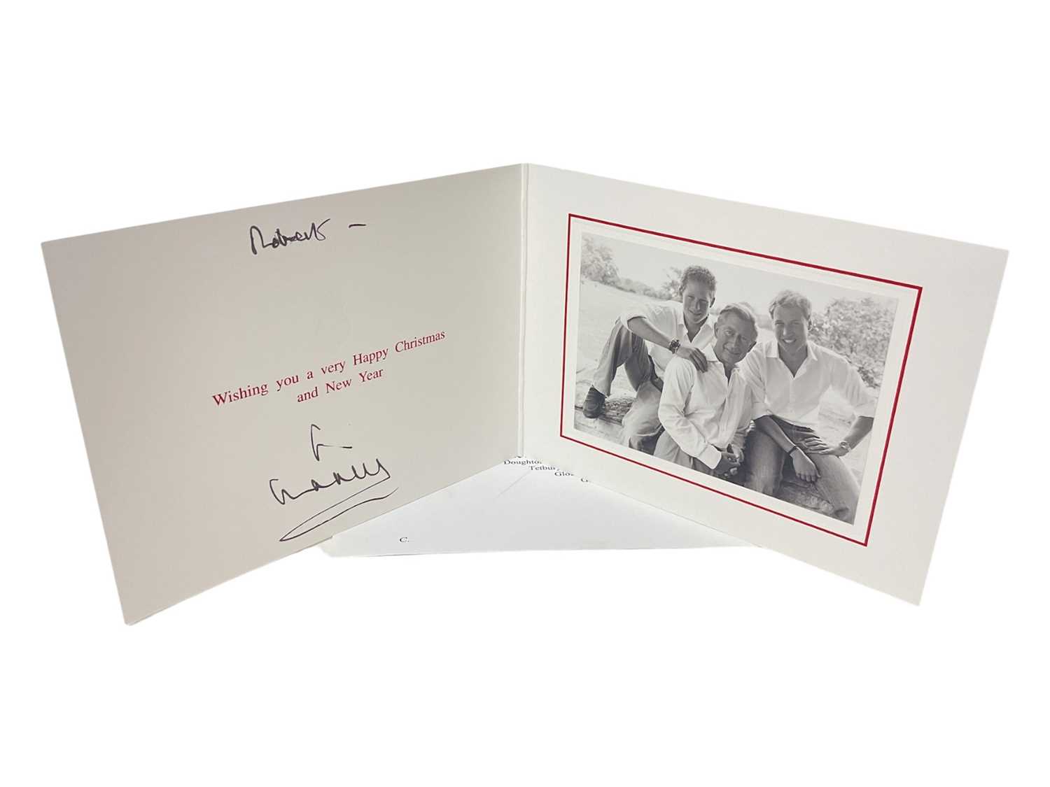 Lot 81 - H.R.H. Prince Charles, Prince of Wales (now H.M. King Charles III) hand signed and inscribed 2004 Christmas card with gilt embossed Royal cypher to cover, photograph of the Prince with Princes W...