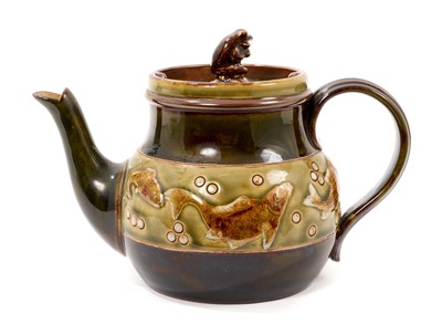 Lot George Tinworth for Doulton, Teapot with carp border and frog knop
