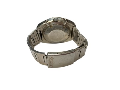 Lot 64 - 1970s Seiko Chronograph Automatic wristwatch, with circular yellow dial, day and date aperture, subsidiary seconds, red and blue 'Pepsi' bezel measuring 38mm diameter, in a stainless steel case...