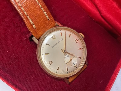 Lot 65 - 1960s 9ct gold cased Smiths Astral wristwatch (Edinburgh 1965) with engraved presentation inscription to reverse, 32mm diameter, on brown leather strap, in Smiths red case