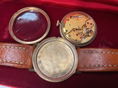 Lot 65 - 1960s 9ct gold cased Smiths Astral wristwatch (Edinburgh 1965) with engraved presentation inscription to reverse, 32mm diameter, on brown leather strap, in Smiths red case