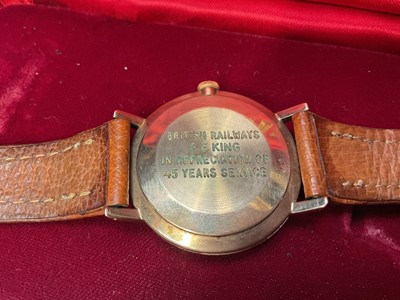 Lot 65 - 1960s 9ct gold cased Smiths Astral wristwatch (Edinburgh 1965) with engraved presentation inscription to reverse, 32mm diameter, on brown leather strap, in Smiths red case