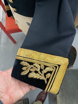 Lot 5 - H.M. Queen Elizabeth II British Diplomats' court uniform comprising tailcoat with gold bullion work decoration and gilt brass Royal Coat of Arms buttons, trousers with broad gold bullion strip,...