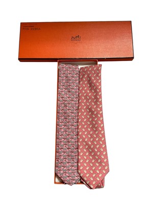 Lot 2503 - Two Hermès silk ties, pink saddle 7173 FA and 7110 OA, pink zebra, in one box